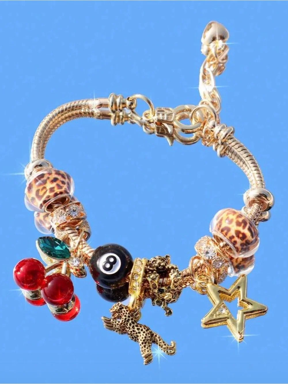 Gold Charm Bracelet with Black 8-Ball, Red Cherry & Leopard Beads